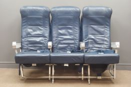 Three aeroplane seats, upholstered in blue leather,