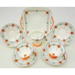 Art Deco Shelley Vogue shaped part tea set decorated in the Diamonds pattern comprising tea cups,