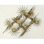 Wall mounted nail sculpture by Nail Neasom, Hartlepool, with gilt star burst decoration,