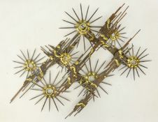 Wall mounted nail sculpture by Nail Neasom, Hartlepool, with gilt star burst decoration,