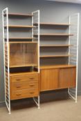 Laddarax sectional wall unit, two bays with four long and three short shelves,