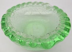 Daum Nancy green glass dish with bubble inclusions and waved rim, signed,