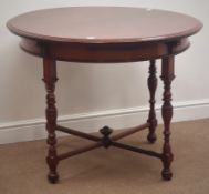 Edwardian circular mahogany centre table, turned supports joined by stretchers D99cm,