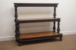 Victorian carved oak three tier buffet stand, turned supports, W133cm, H112cm,
