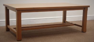 Light oak rectangular coffee table, square chamfered legs joined by stetchers, 125cm x 70cm,