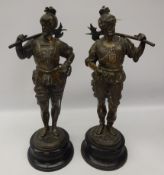 Pair of late 19th century Spelter figures of knights ebonised socle bases,
