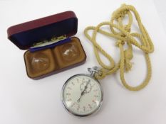 Pair of 1960's contact lenses with original receipt and a chrome plated stopwatch