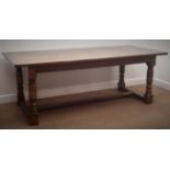 17th century style oak refectory table, turned supports joined by floor stretcher, 214cm x 92cm,