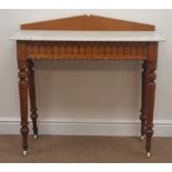 Late Victorian golden oak marble top washstand, shaped raised back, carved frieze, turned supports,