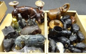 Collection of various models of elephants, bison,