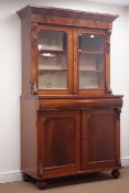 Victorian mahogany bookcase on cupboard, projecting cornice,