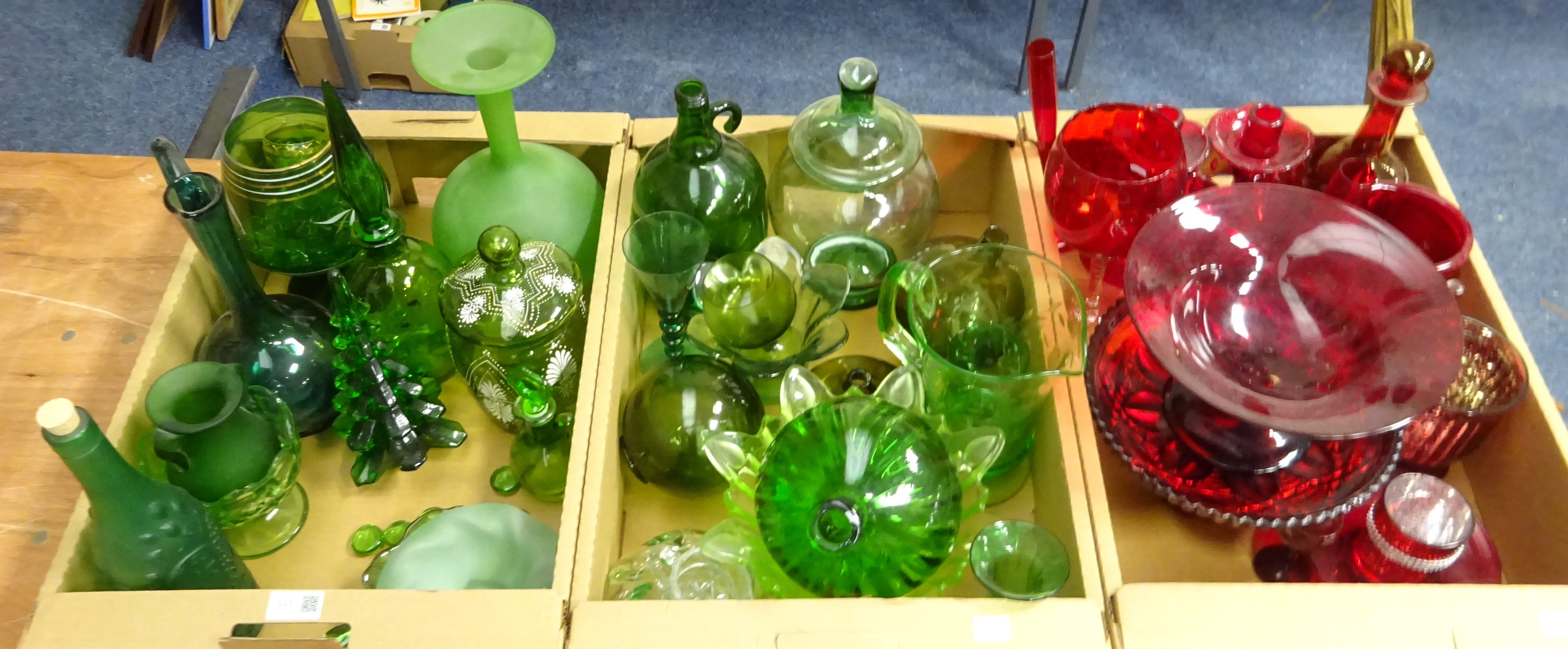 Red and green coloured glass incl carafe, footed bowls,