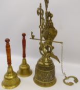 Cast brass church style wall-mounted bell with Latin script,