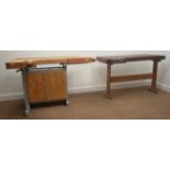 Two timber workshop work benches, fitted with vices and a storage cupboard (W120cm, H75cm,