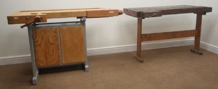 Two timber workshop work benches, fitted with vices and a storage cupboard (W120cm, H75cm,