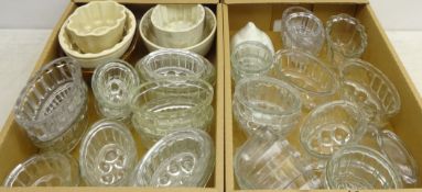 Collection of thirty-eight Victorian and later pottery and glass graduated oval and circular jelly
