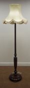Early 20th century walnut standard lamp, with shade,