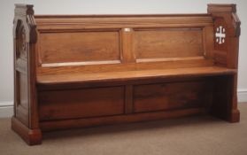 Victorian Gothic revival stained pine pew, panelled back, pierced solid end supports, W165cm, H90cm,