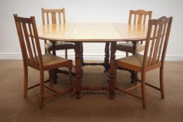 Early 20th century light oak drop leaf table, gate leg action, turned supports (137cm x 175cm,