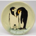 Moorcroft limited edition plated decorated with a family of Emperor Penguins,
