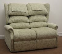 CosiChair two seat sofa, upholstered in a green floral fabric,