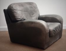 Distressed leather armchair,