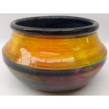 Moorcroft bowl of bulbous circular form decorated with plain glazed bands shading from blue to