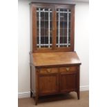 Late 19th century mahogany bureau bookcase, lead glazed doors enclosing two shelves,