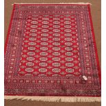 Bokhara red ground rug,