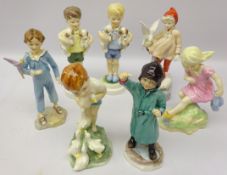 Seven Royal Worcester figures by Freda Doughty comprising 'November', 'February', 'March',