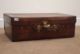 Ealry 20th century leather suit case, hinged lid, clasp and carrying handle, W68cm, H26cm,