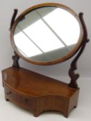 Inlaid mahogany oval swing toilet mirror with curving supports,