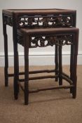 Early 20th century Chinese hardwood nest of two occassional tables,