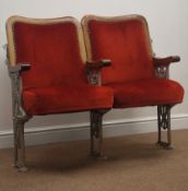 Pair of Theatre seats, pierced cast iron frame with wooden arm rests and hinged upholstered seat,