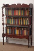 19th century mahogany four tier bookcase, containing novels by Irwin Shaw, Gerald Hanley,
