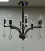 Modern eight branch electrolier, faceted glass terminals and diamante embellishment,