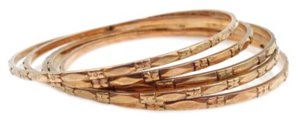 Five rose gold bangles, stamped 9c or 9K Condition Report Approx 33.