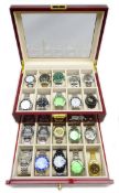 Collection of modern Tevise and other wristwatches in polished storage case