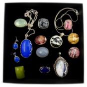Silver lapis lazuli ring, seven stone set rings and pendant,