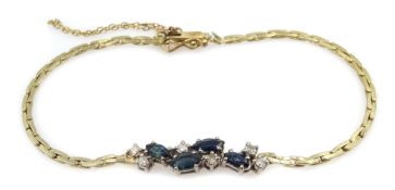 18ct gold link bracelet set with blue topaz and diamonds
