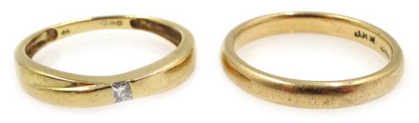 Gold single stone rub over diamond ring and gold wedding band,