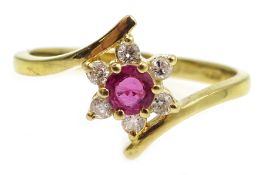 Gold ruby and diamond cluster ring, hallmarked 18ct Condition Report Approx 2.
