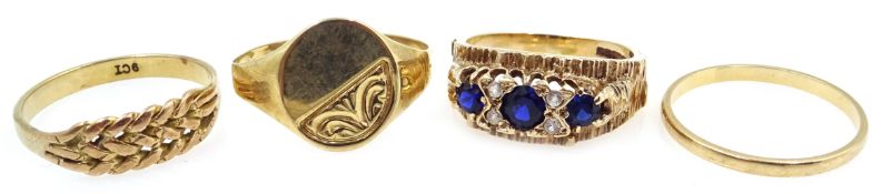 Three 9ct gold rings and one other blue stone set ring Condition Report Gold