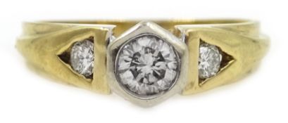 9ct gold ring with centre diamond and a diamond to each shoulder,