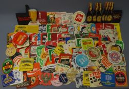 Collection of beer mats including Mackeson, DD, Tetley, Bass, Whitbread, Webster's, Ramsden's,