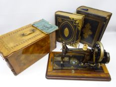 19th/ early 20th century sewing machine housed in walnut inlaid case and two 19th century family