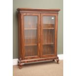 Edwardian style walnut bookcase, two bevel edged glazed doors enclosing two adjustable shelves,