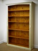 Large solid pine open bookcase, projecting cornice, shaped frieze, reeded detailing,