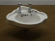 Edwardian style corner hand basin with chromium plated fittings,