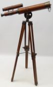 Brass and leather Telescope on tripod stand,